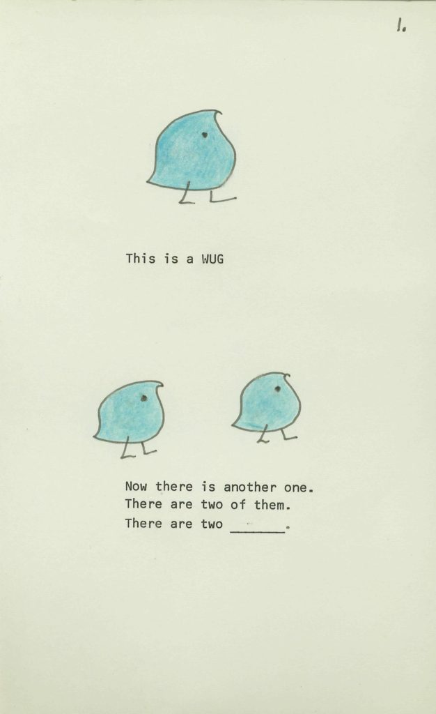 One hand-drawn blue creature is captured with "This is a wug." Then two images of the same blue creature are shown side-by-side, with the caption, "Now there is another one. There are two of them. There are two (blank)."